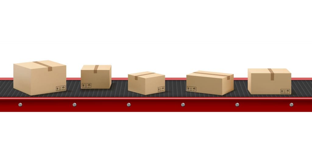 Conveyor Belt with Cardboard Boxes at Factory